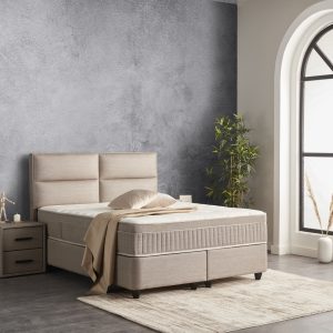 Kontinentālā gulta ROYAL ar metāla rāmi, spilveniem un augstu galvgali, pelēkā audumā